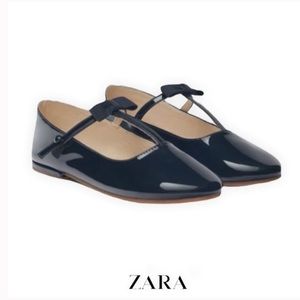 Zara patent T-strap bow shoes